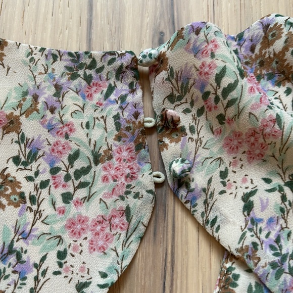 Storia Flutter Sleeve Deep V with Ruffled Tiered Skirt and Open Lace Back - Picture 5 of 6